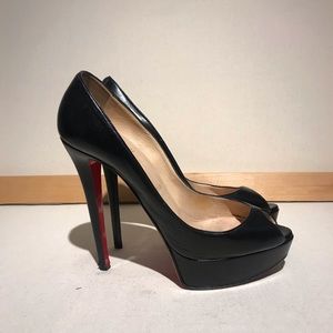 Louboutin 100 peep-toe pump.  Size 38.5